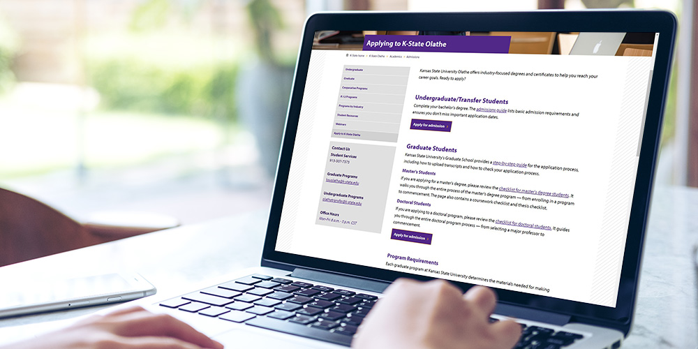 Close-up on fingers typing on laptop.